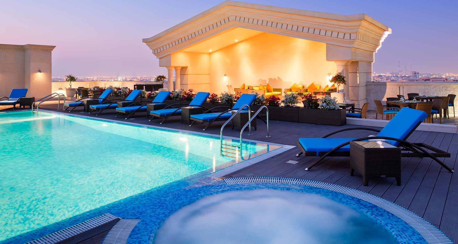 Warwick Doha Hotel Exterior photo The swimming pool at the hotel