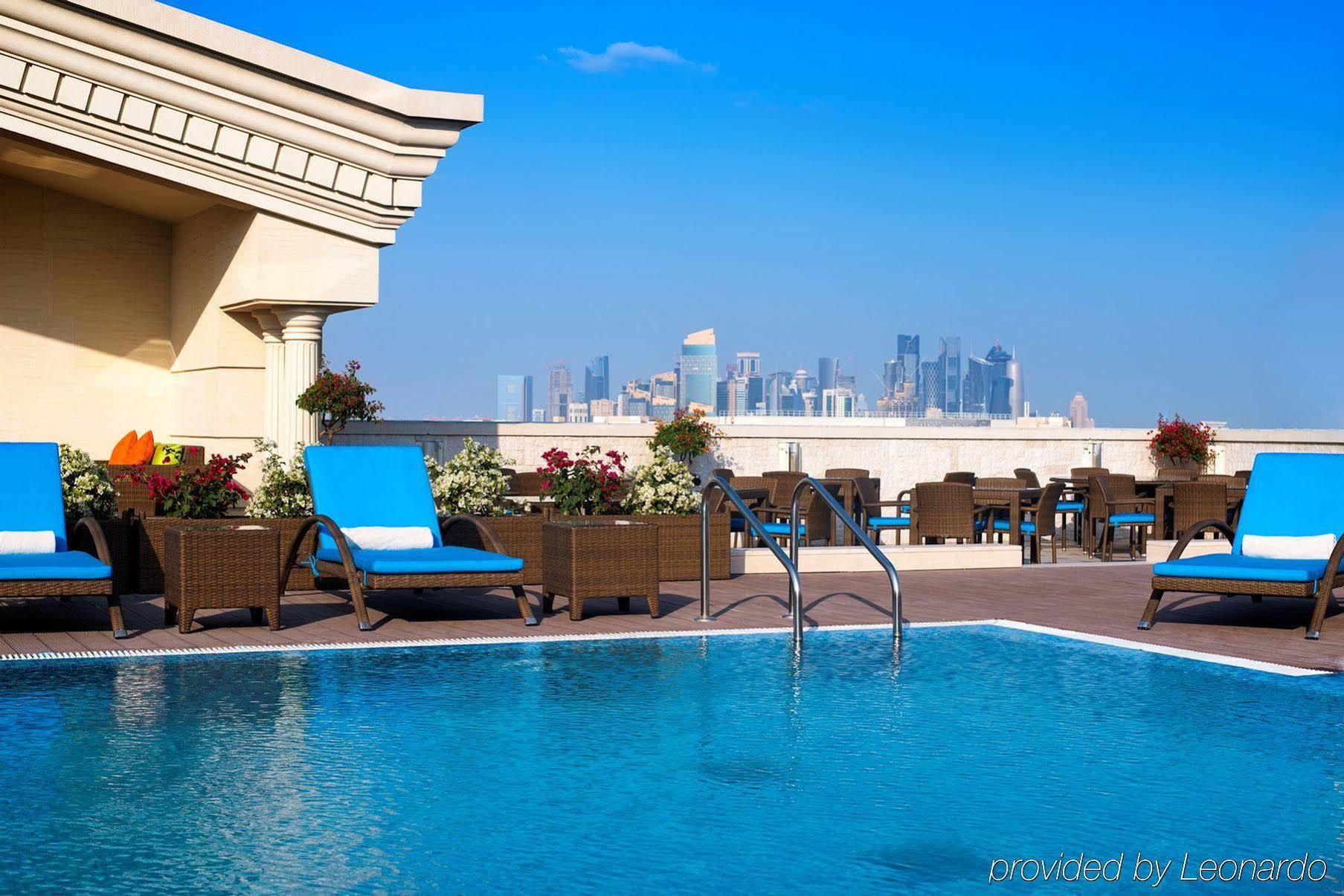 Warwick Doha Hotel Exterior photo Rooftop pool