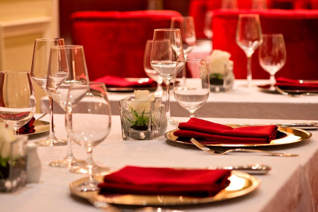 Warwick Doha Hotel Exterior photo A table set for a formal dinner