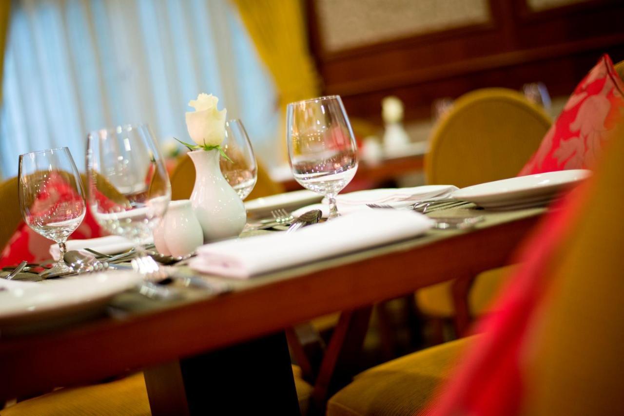 Warwick Doha Hotel Exterior photo A table set for a meal