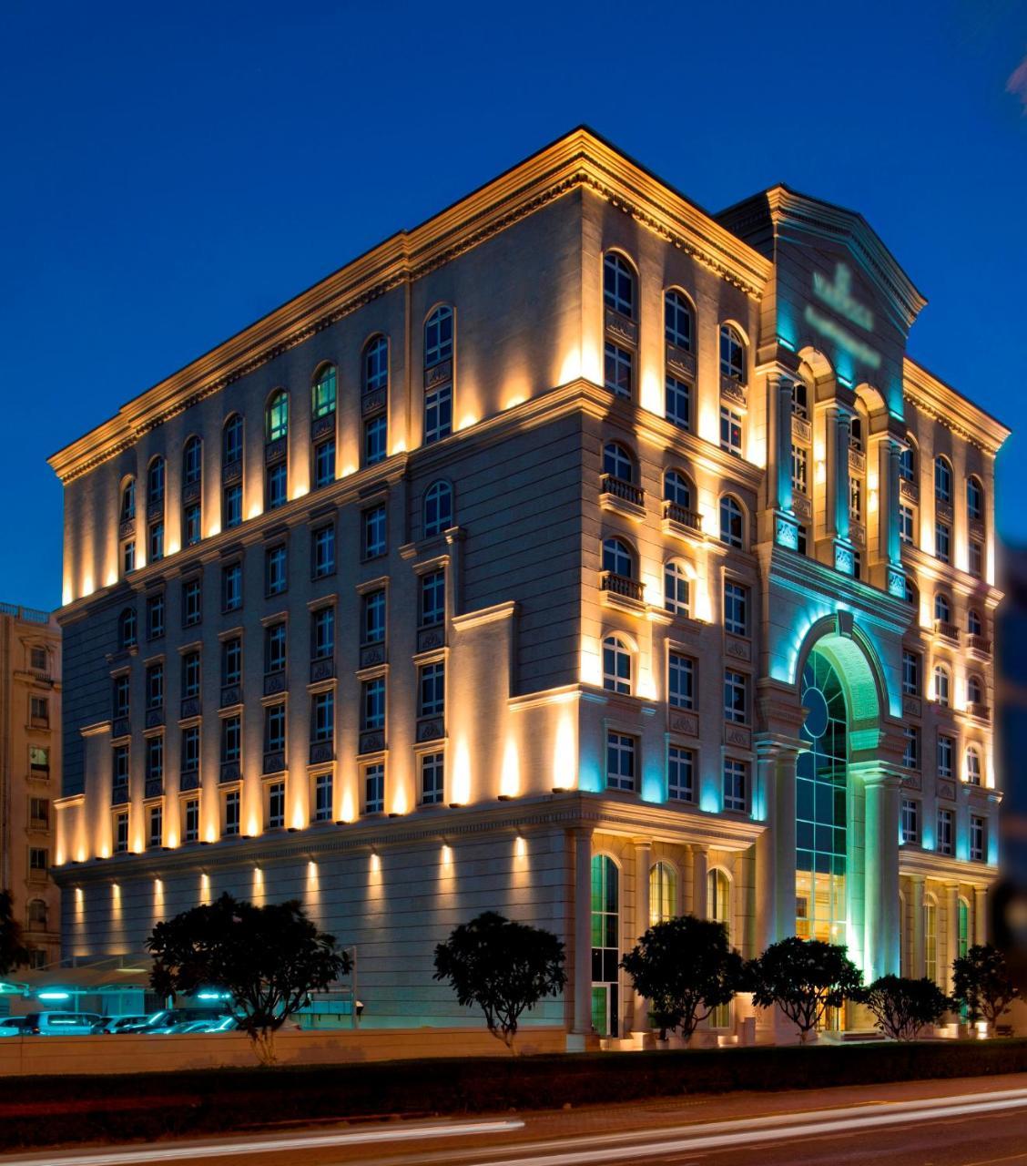 Warwick Doha Hotel Exterior photo The hotel at night