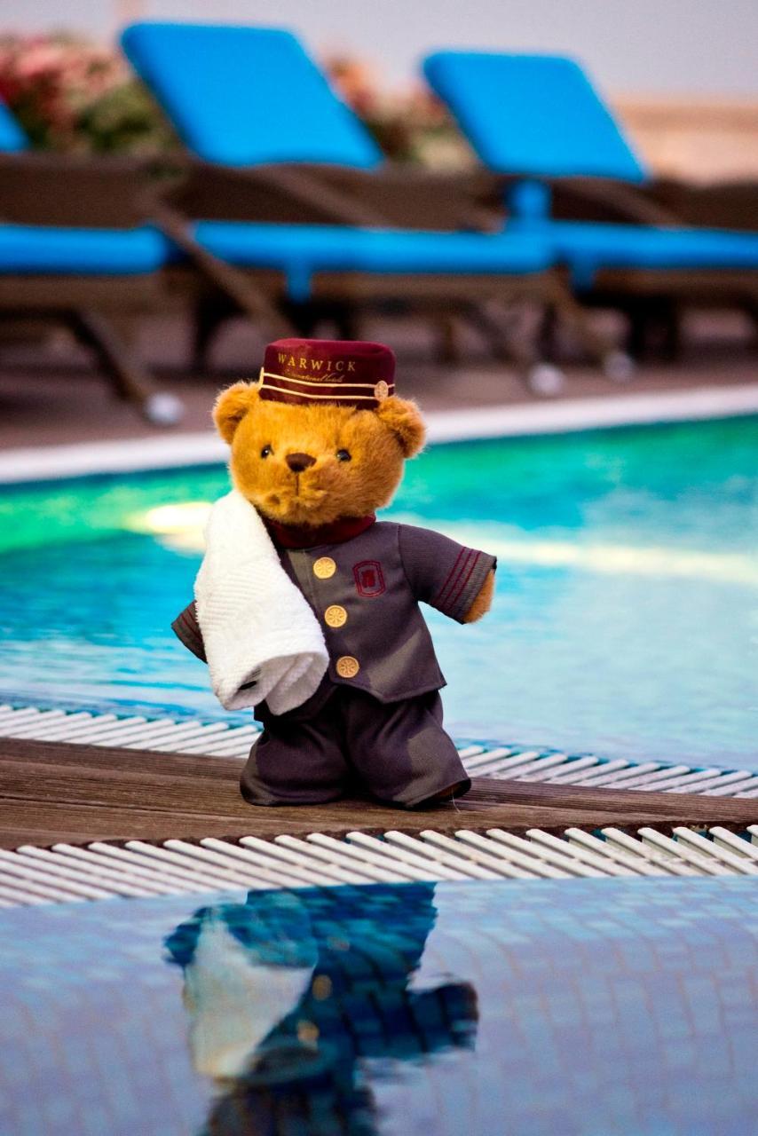 Warwick Doha Hotel Exterior photo The Warwick Bear